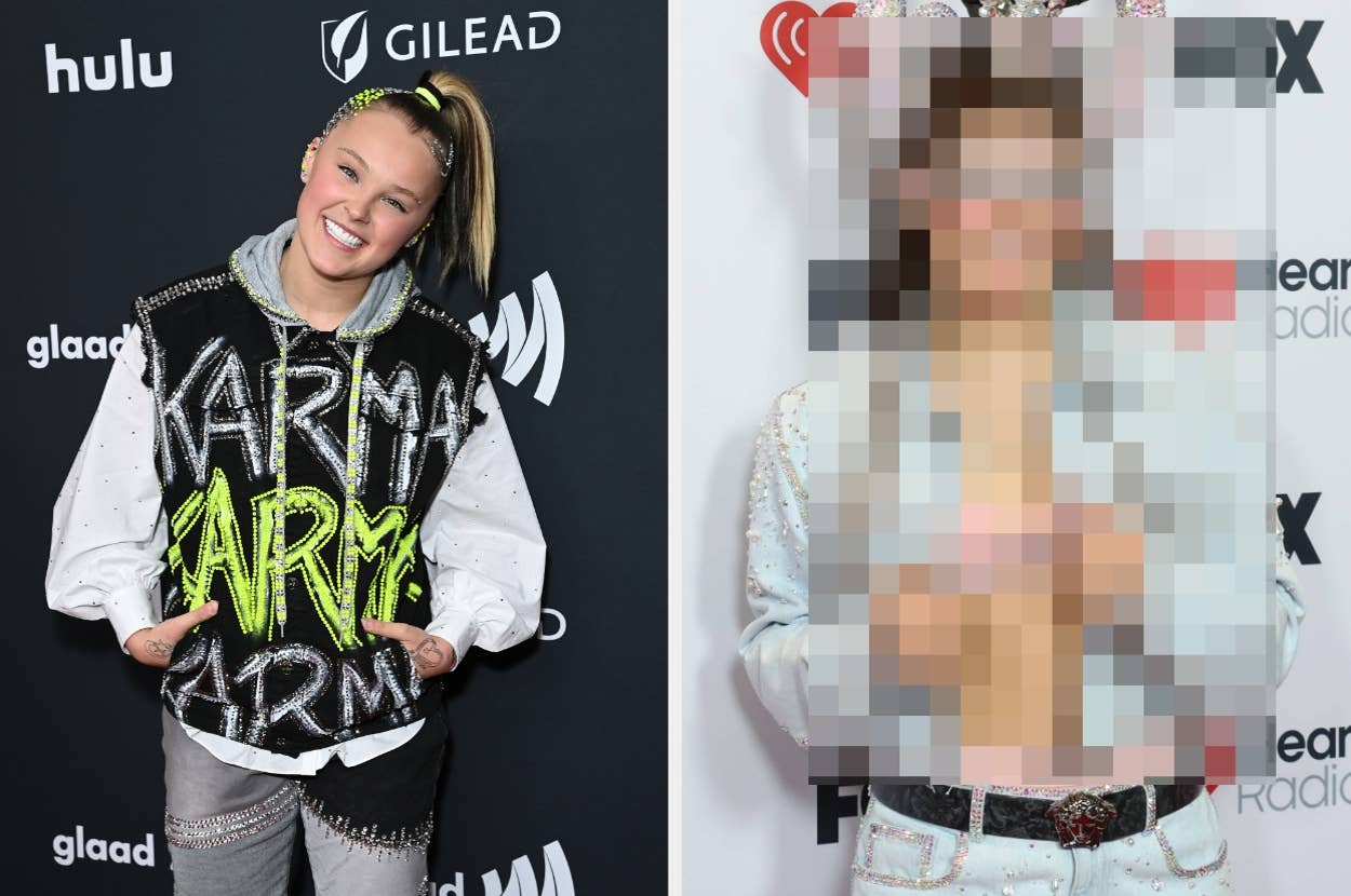 Person on the left wearing a graphic hoodie poses at an event backdrop. Another person on the right is pixelated, standing against a HeartRadio logo backdrop