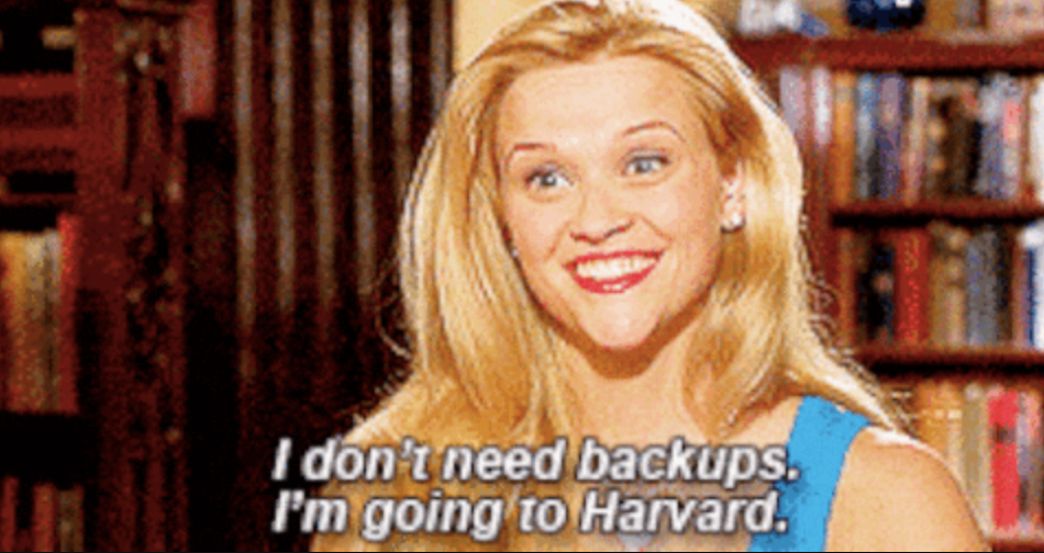 Woman smiling with excitement, saying, "I don't need backups. I'm going to Harvard," in a scene suggesting confidence and determination