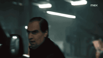 Colin Farrell shooting a gun as the titular character in &quot;The Penguin&quot;