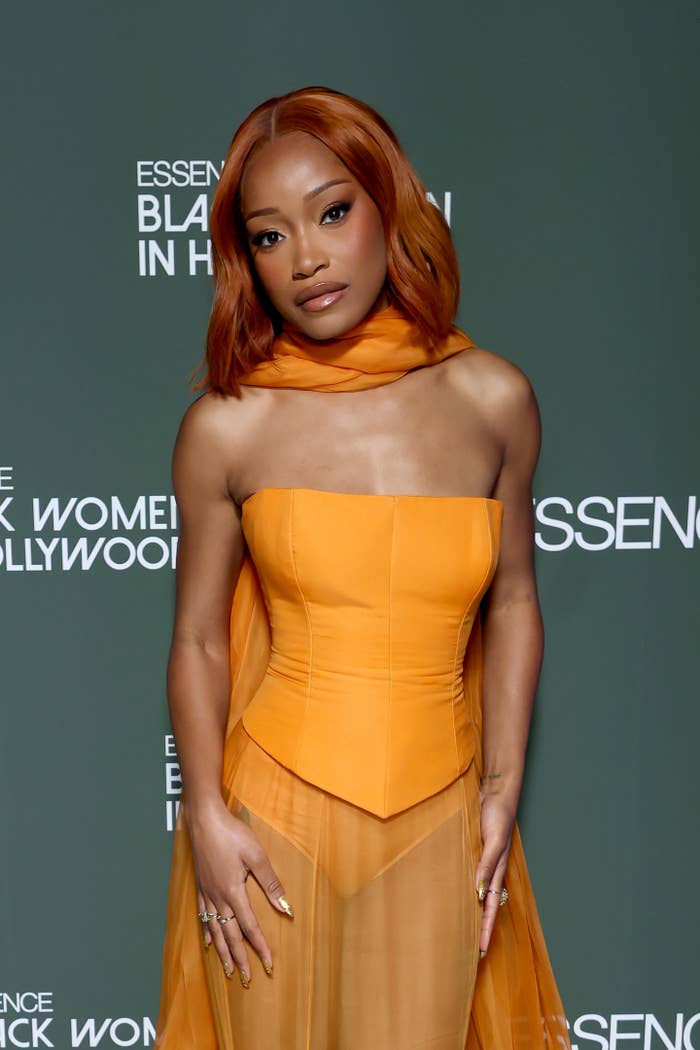 Keke Palmer poses in strapless gown with sheer scarf at an Essence Black Women in Hollywood event