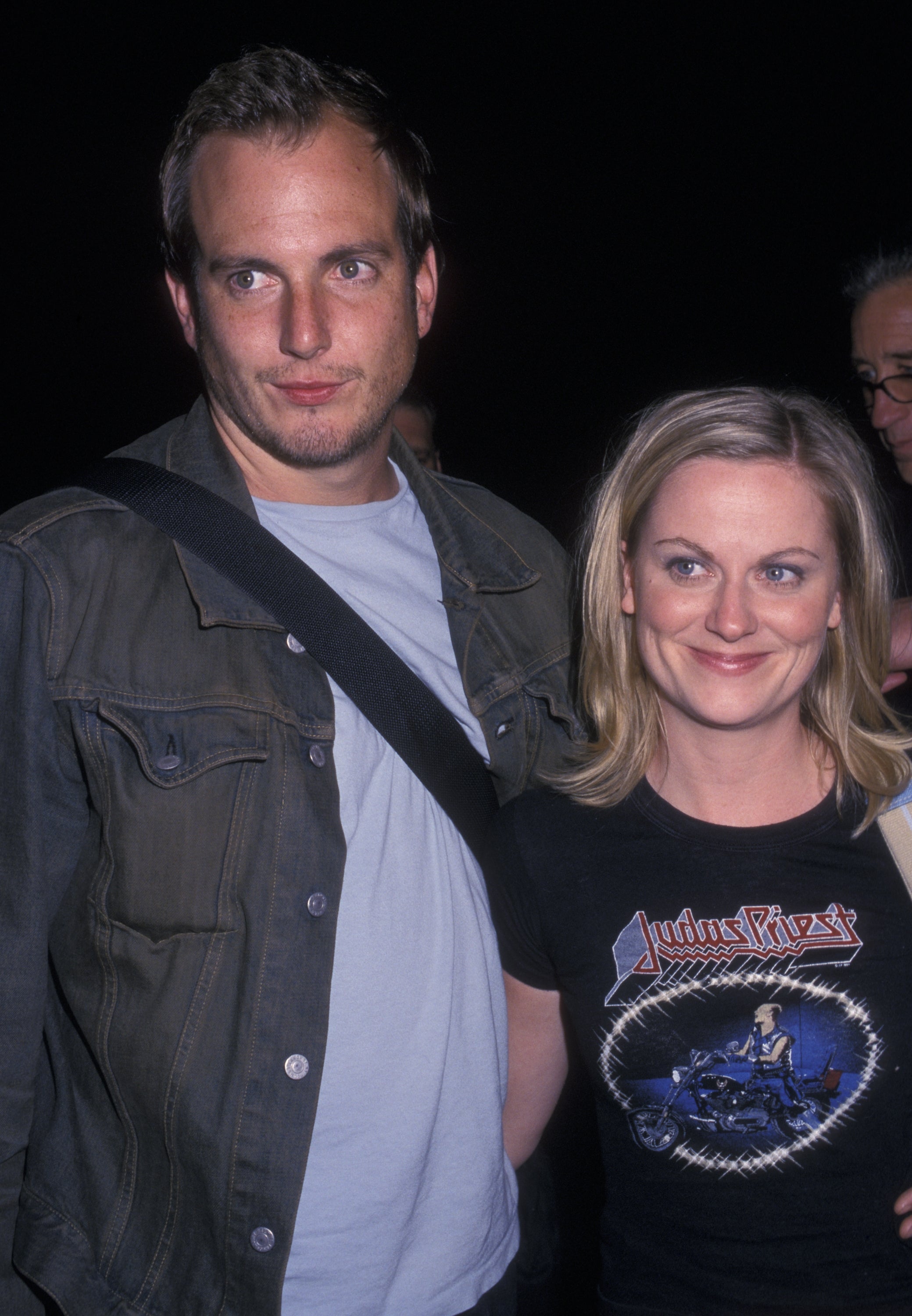 Amy Poehler and Will Arnett posing together and smiling, 2002