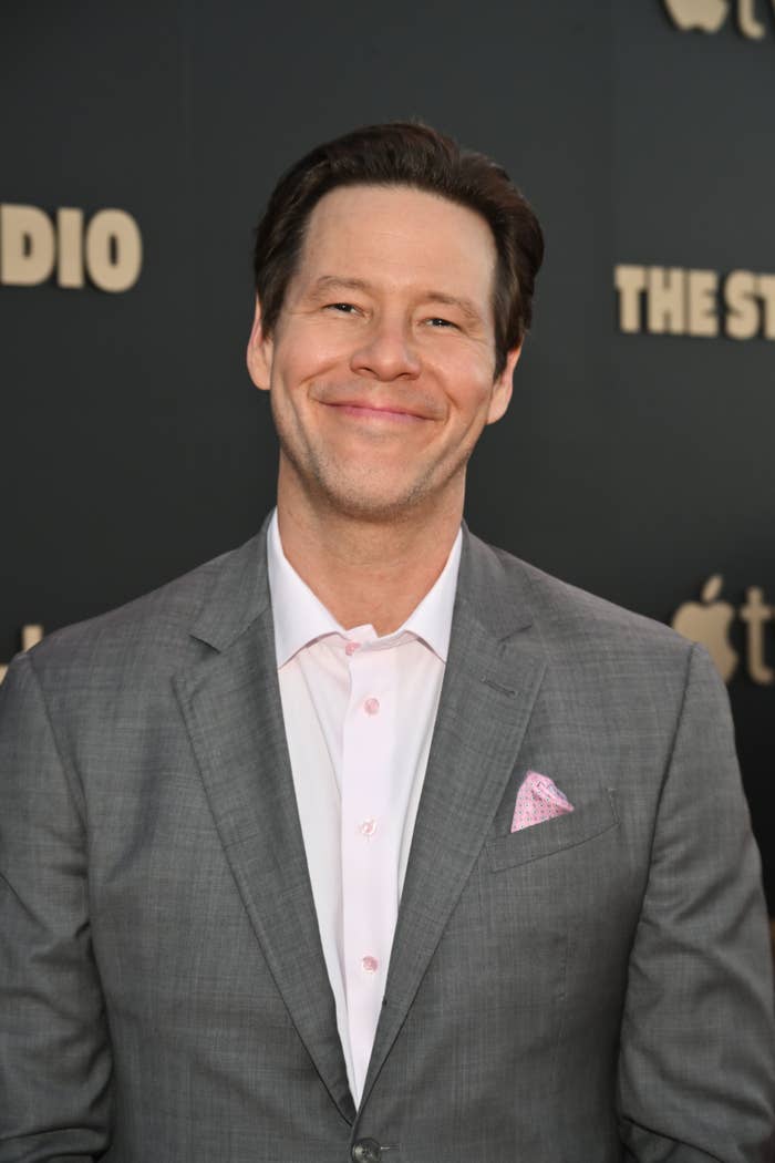 Ike Barinholtz smiling at an event