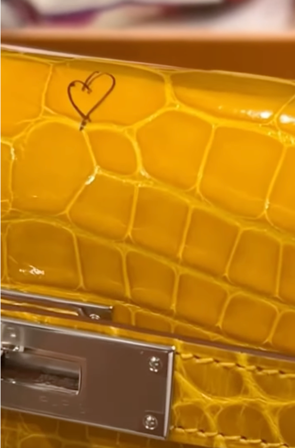 Cardi's Birkin with the heart, close up