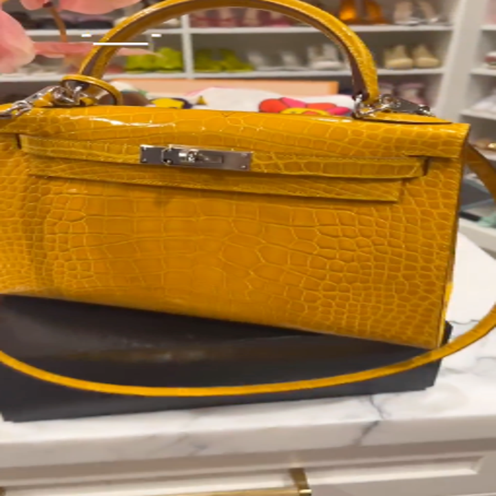Cardi's yellow Birkin from far away
