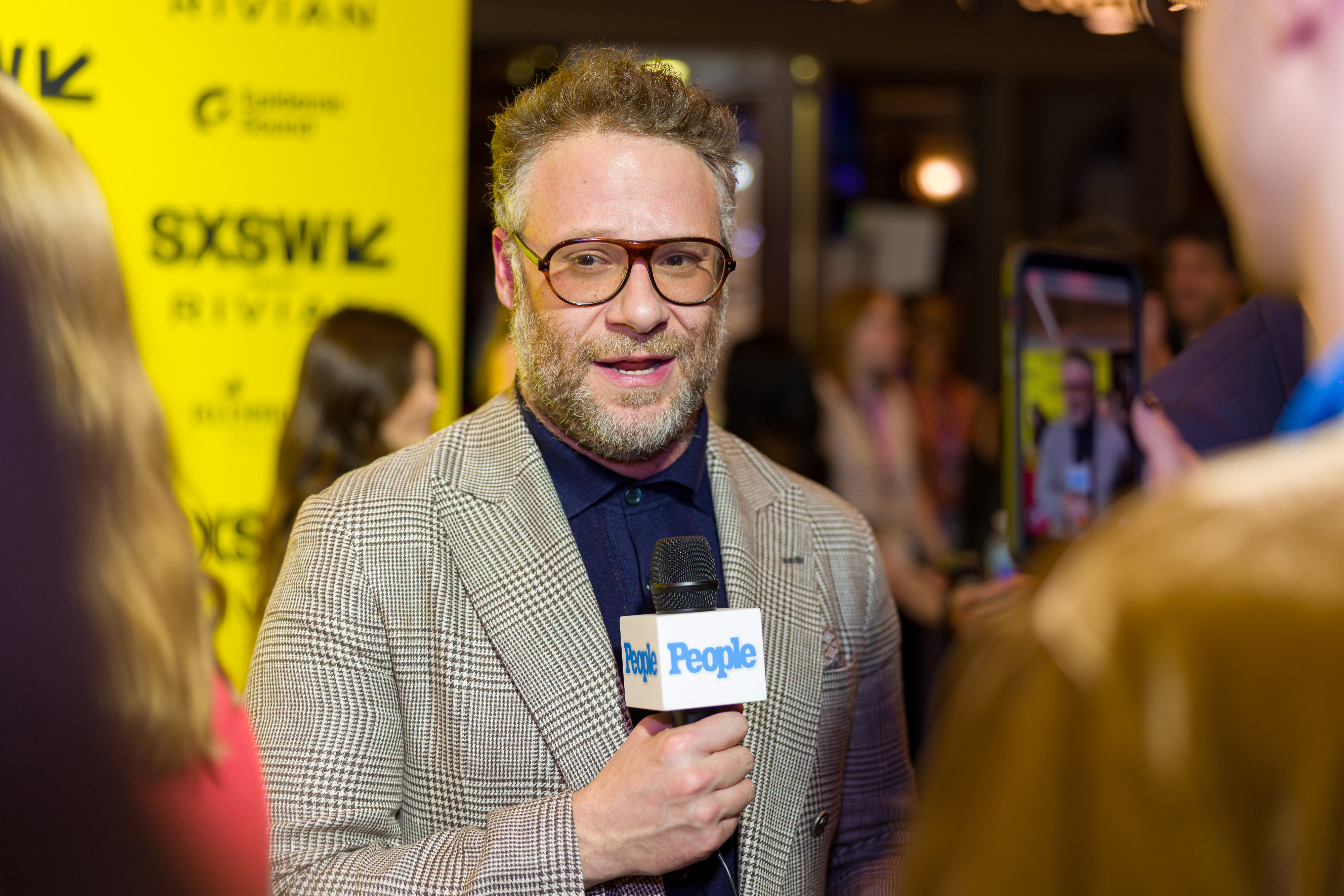 Seth Rogen speaking on a red carpet