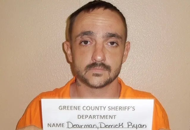 Man successful an orangish situation jumpsuit holding a motion with the Greene County Sheriff's Department information