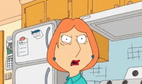 Animated character with short hair looks surprised in a kitchen setting, standing near a fridge with papers and magnets