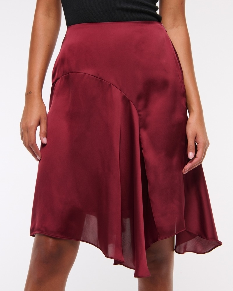Model wearing the maroon skirt