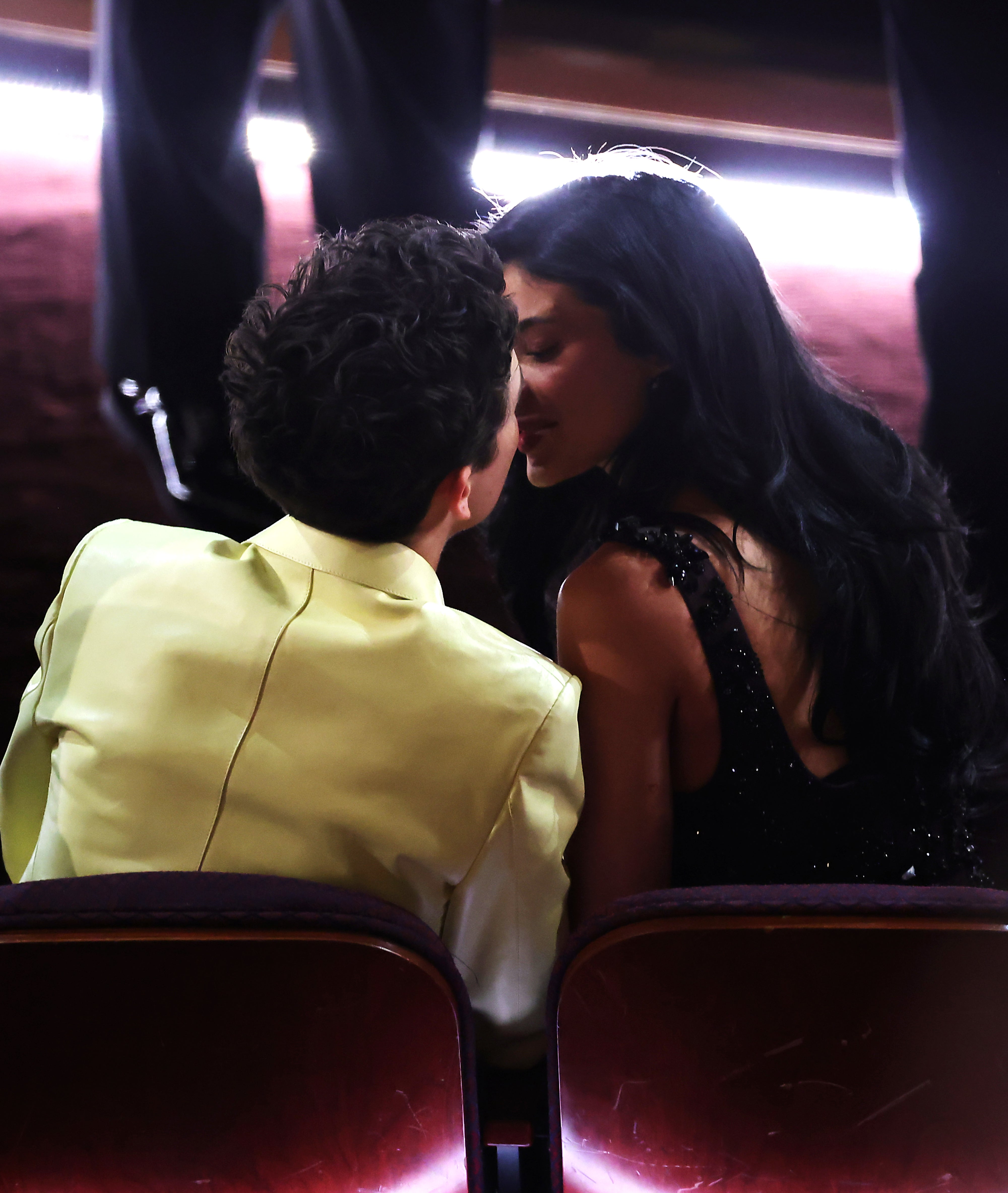 Timothée Chalamet and Kylie Jenner lean in for a kiss while sitting front row at the oscars