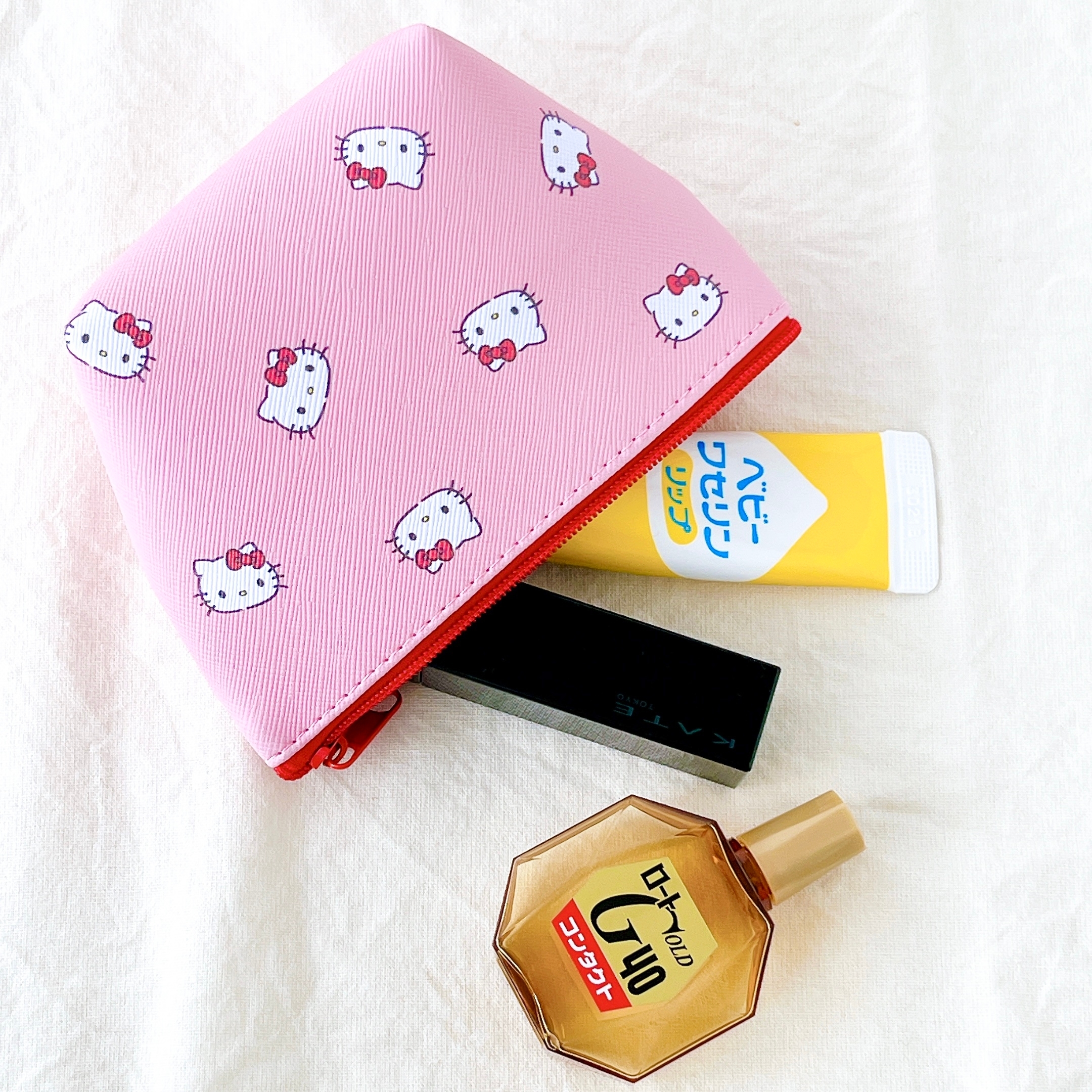 セリアの「ミニポーチ(舟形)K/T 文字」