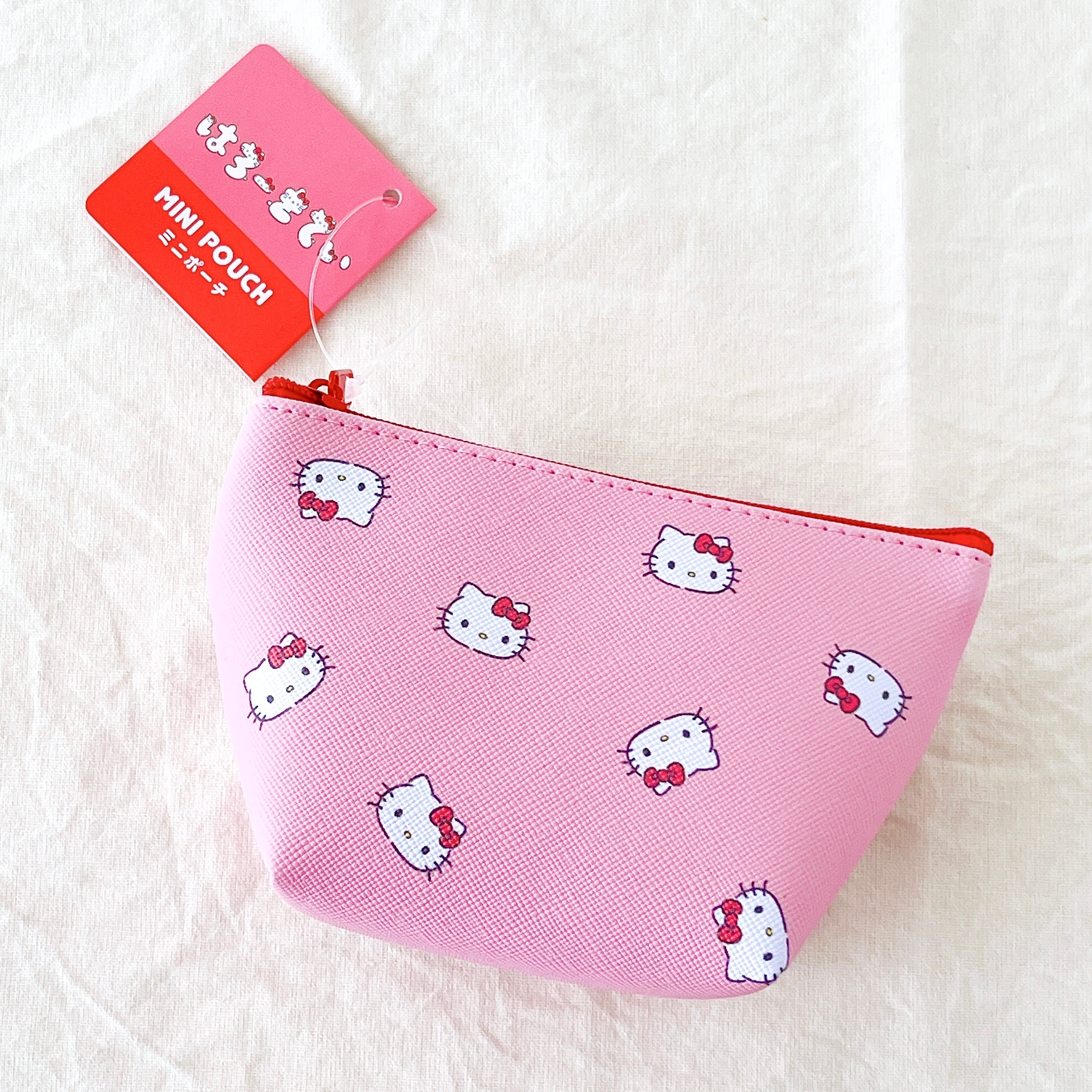 セリアの「ミニポーチ(舟形)K/T 文字」