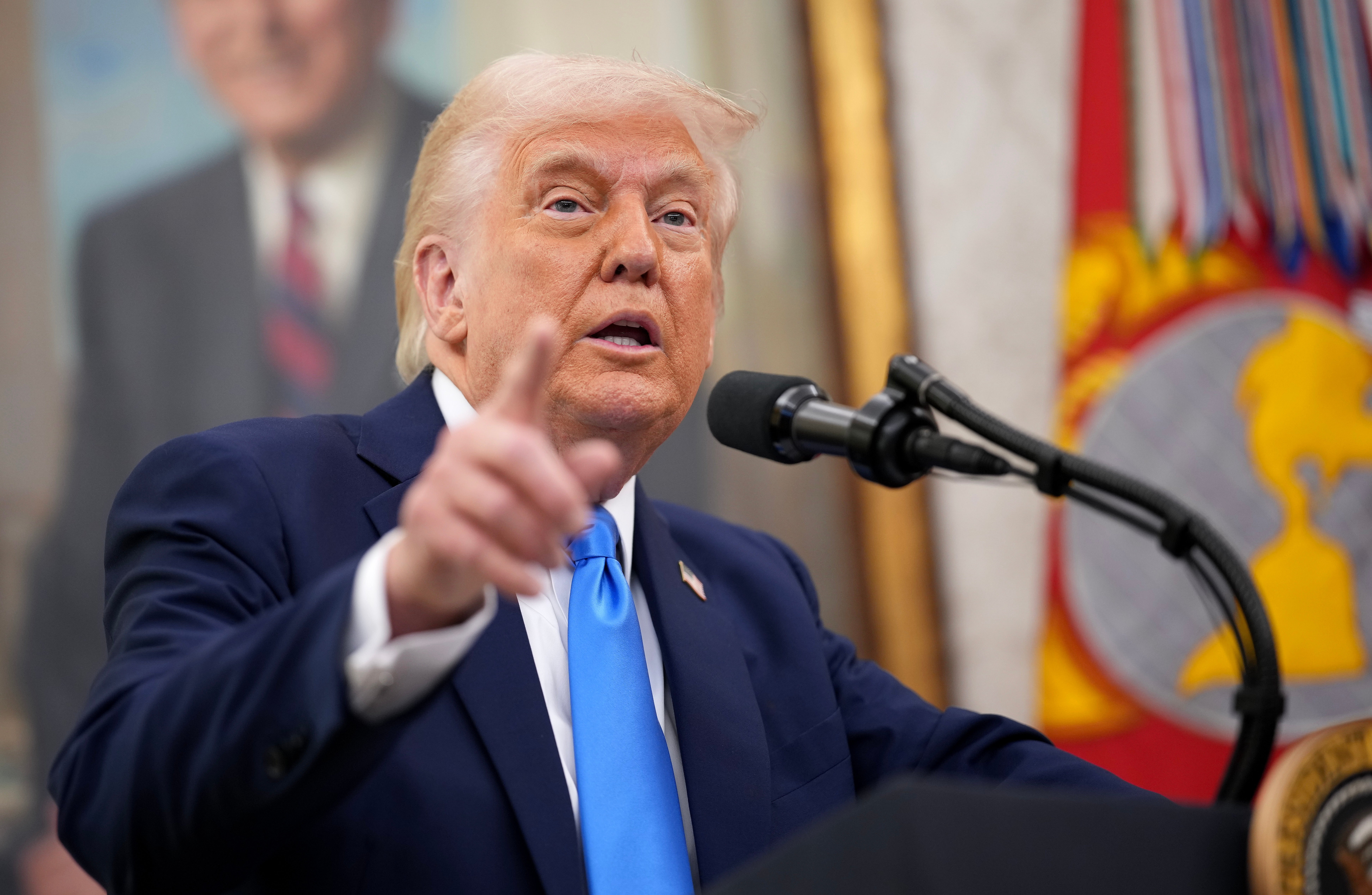 U.S. President Donald Trump speaking at a podium