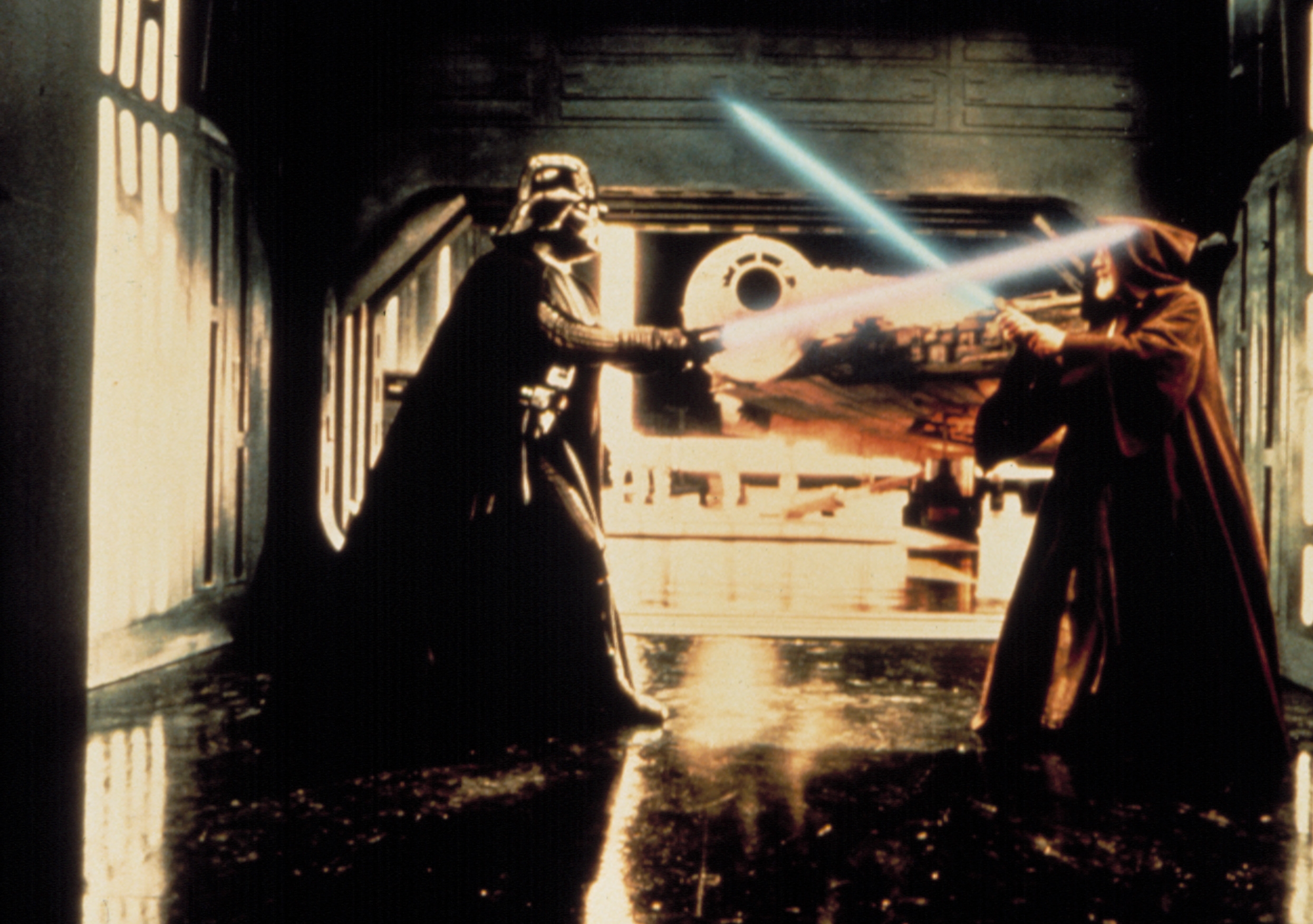 Darth Vader and Obi-Wan Kenobi engage in a lightsaber duel aboard the Death Star in a scene from &quot;Star Wars.&quot;