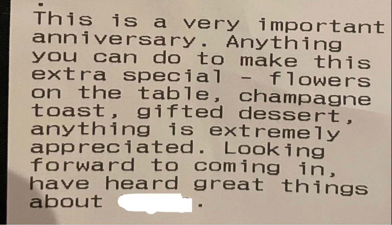 Summary of note: Request for special anniversary arrangements, including flowers, champagne, and dessert. Looking forward to visiting