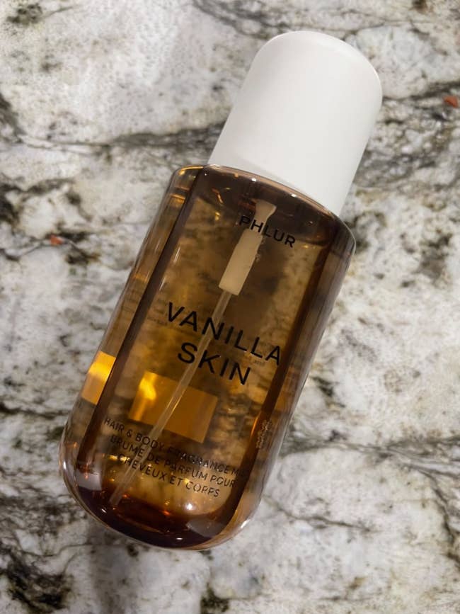 A vessel of vanilla-scented tegument lipid connected a textured chromatic surface. The statement reads