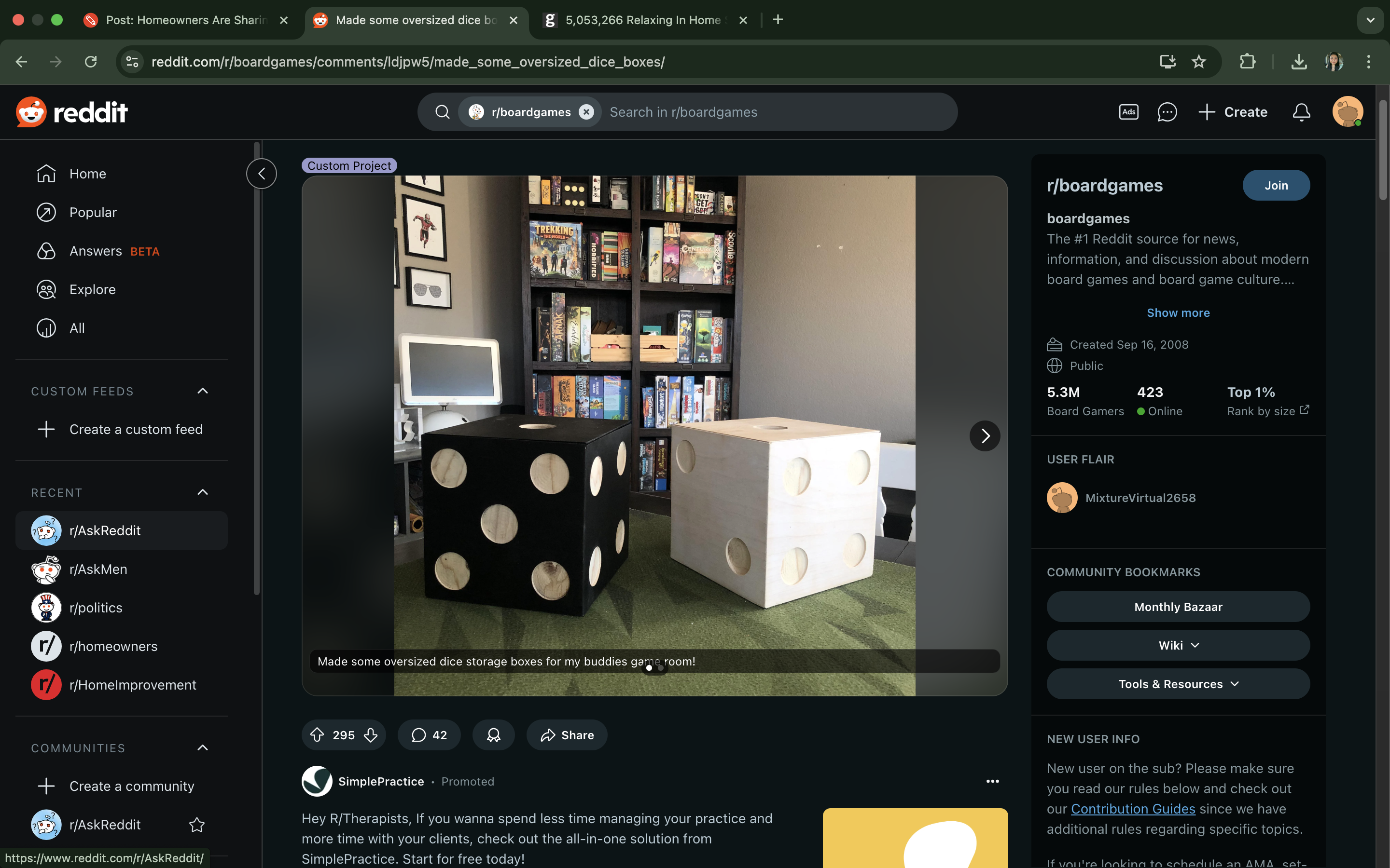 Reddit page showing two oversized dice used as storage boxes in a post on the r/boardgames subreddit
