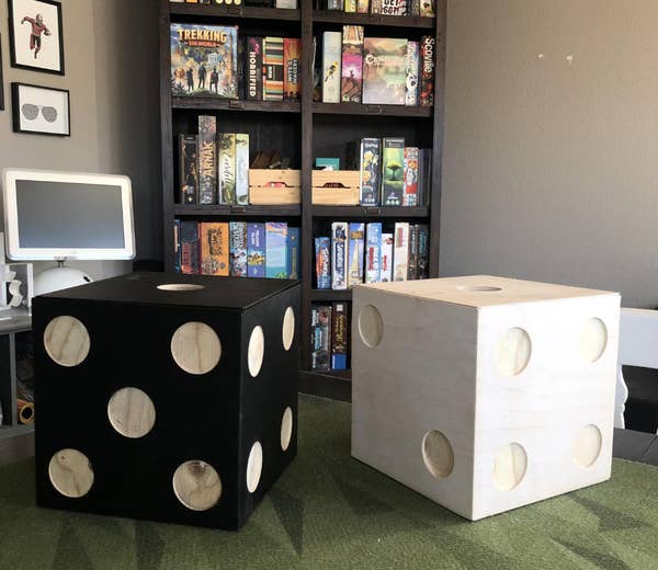 Reddit page showing two oversized dice used as storage boxes in a post on the r/boardgames subreddit