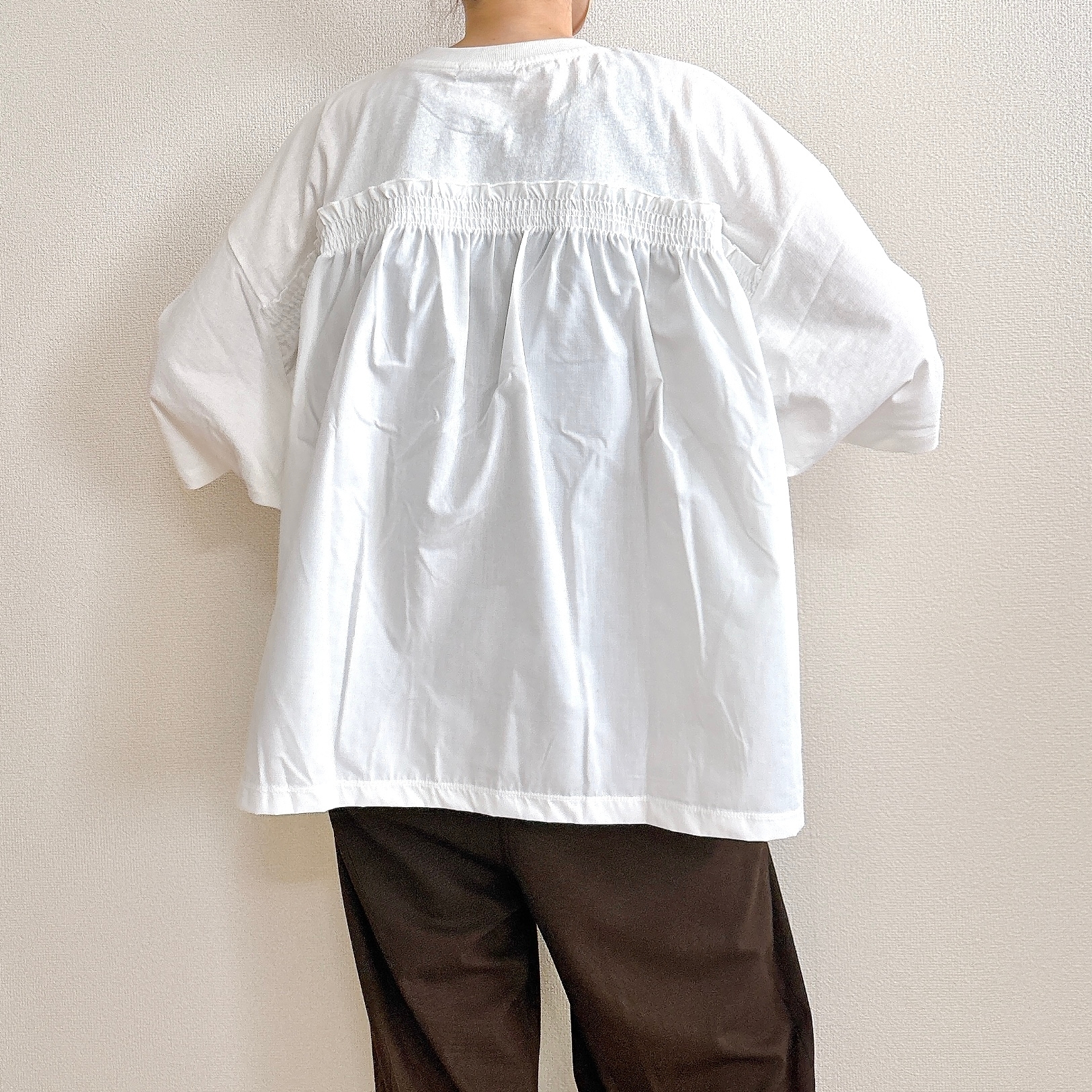 ニコアンド「バック布帛CITYフォトTシャツ」