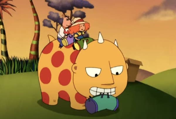 A cartoon dinosaur carrying two characters, a red-haired child and a pig in a costume, on its back in a whimsical landscape
