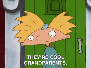 Animated character Arnold from &quot;Hey Arnold!&quot; stands in front of a green door, saying, &quot;They&#x27;re cool grandparents.&quot;