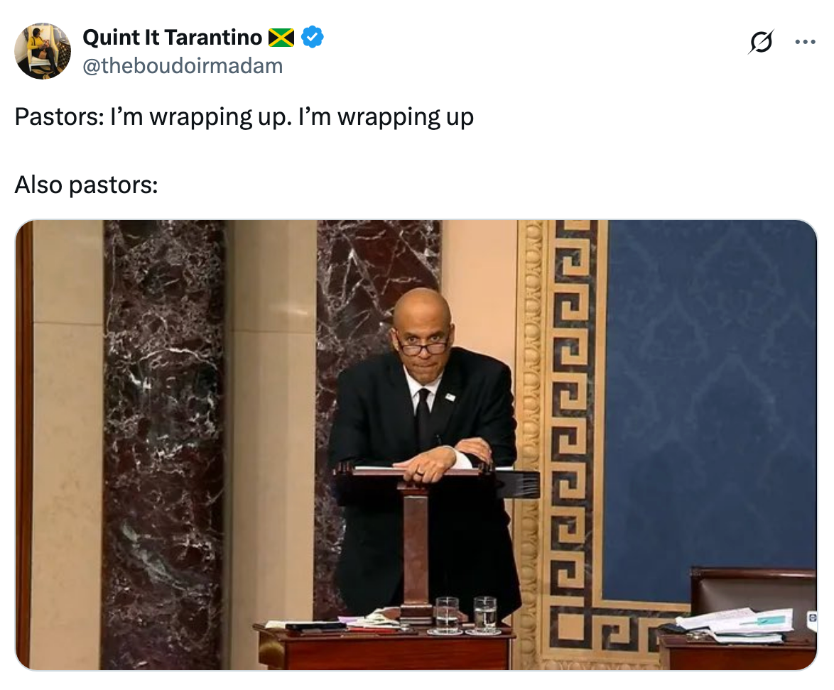 Man standing at a podium in a formal setting with caption above: "Pastors: I'm wrapping up. I'm wrapping up. Also pastors:"