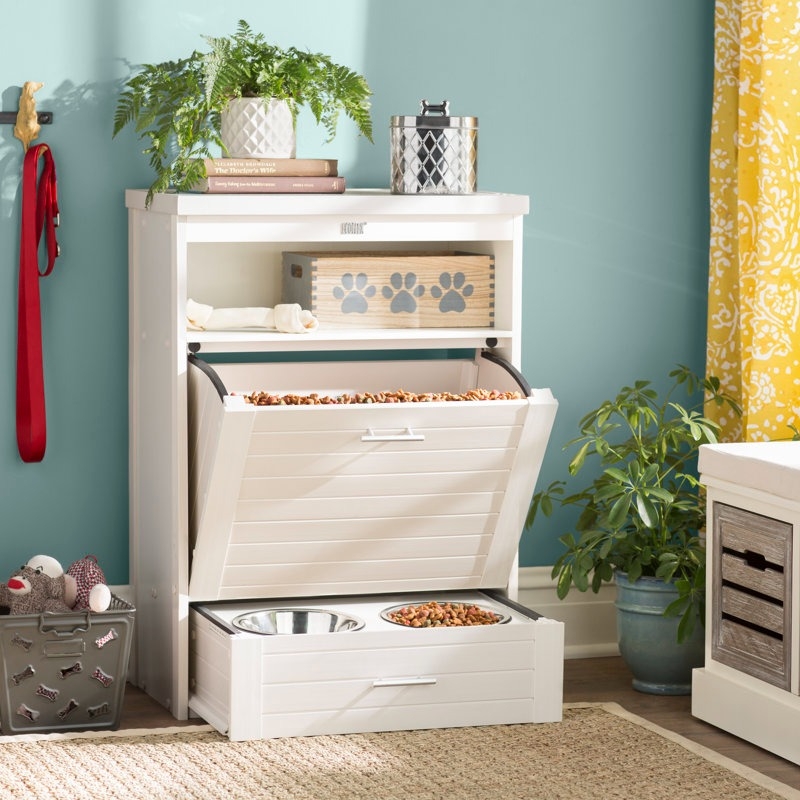 Pet storage unit with pull-out food container, built-in feeder, and decorative plant on top