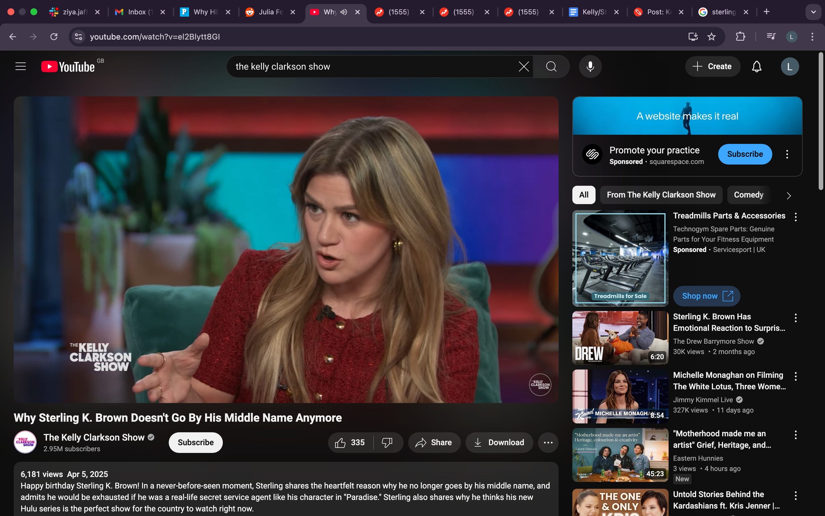 Kelly Clarkson on a talk show, gesturing while speaking