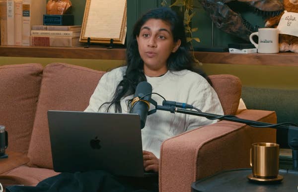 Monica Padman speaking on a podcast