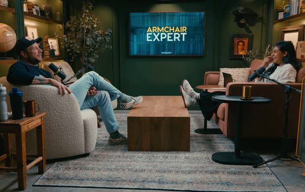 Dax Shepard and Monica Padman speaking on a podcast