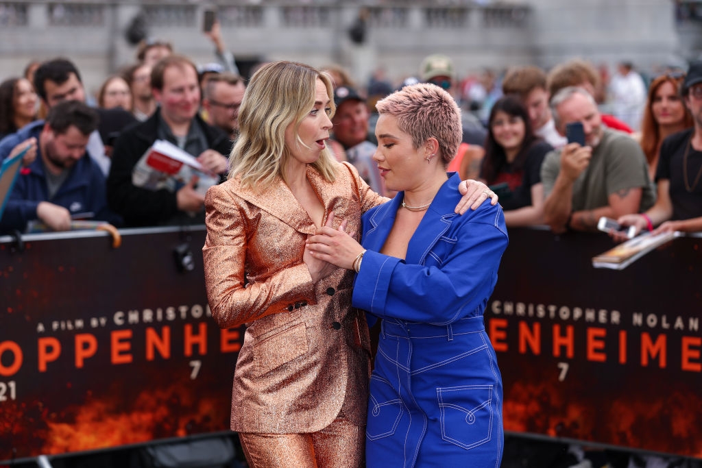 Florence holds her hand over Emily's