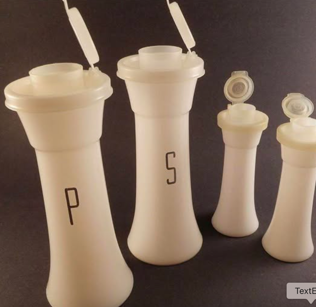 Set of four white, cone-shaped containers labeled "P" and "S" with flip-top lids