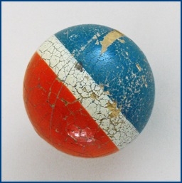 Worn-out toy ball with a cracked surface, featuring blue, white, and red sections, resting on a plain background