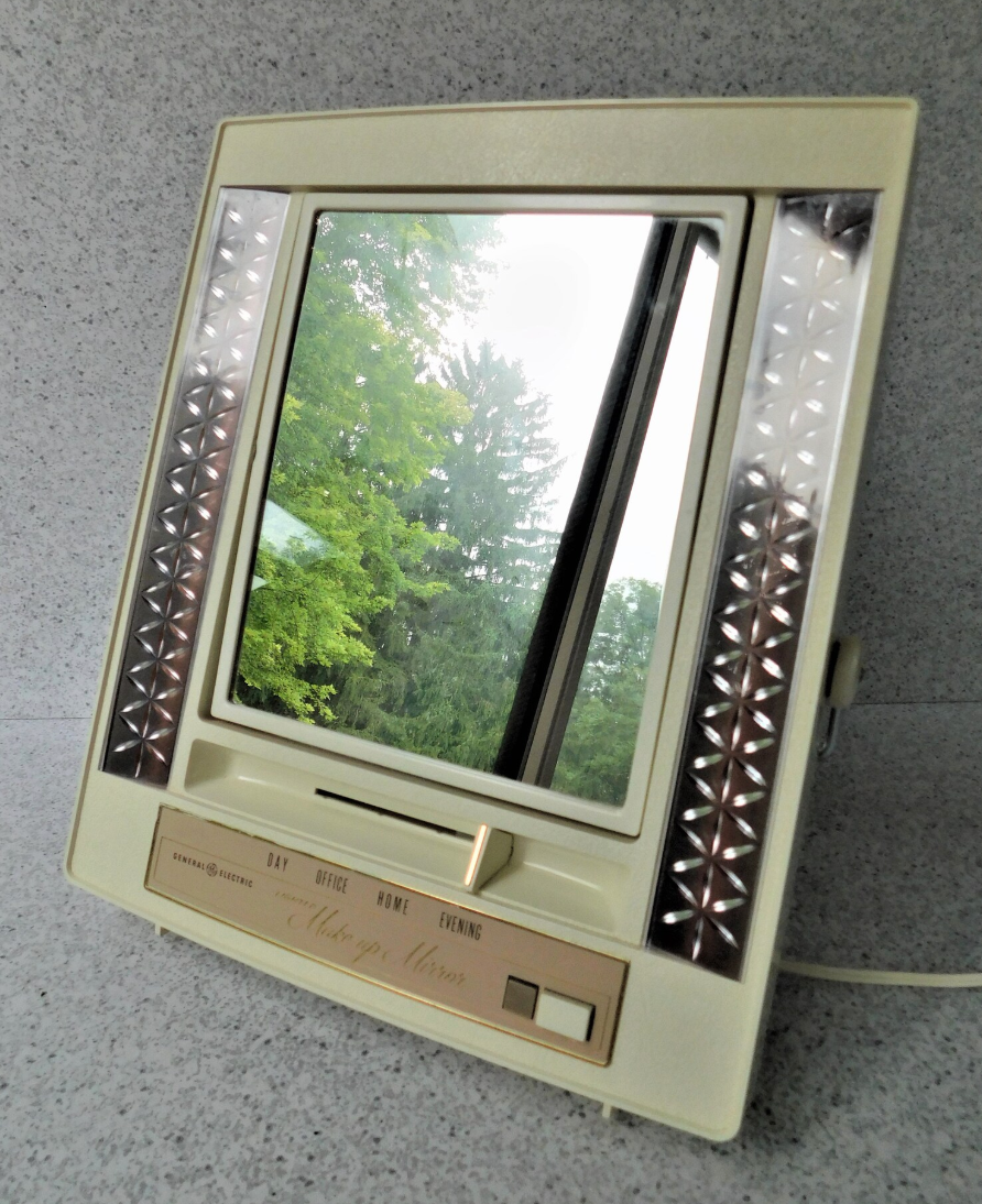 Vintage lighted makeup mirror with adjustable lighting settings