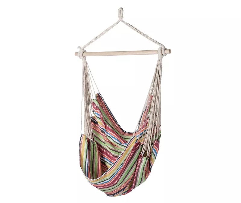 Striped hanging hammock chair with a wooden bar and rope support, ideal for comfortable lounging