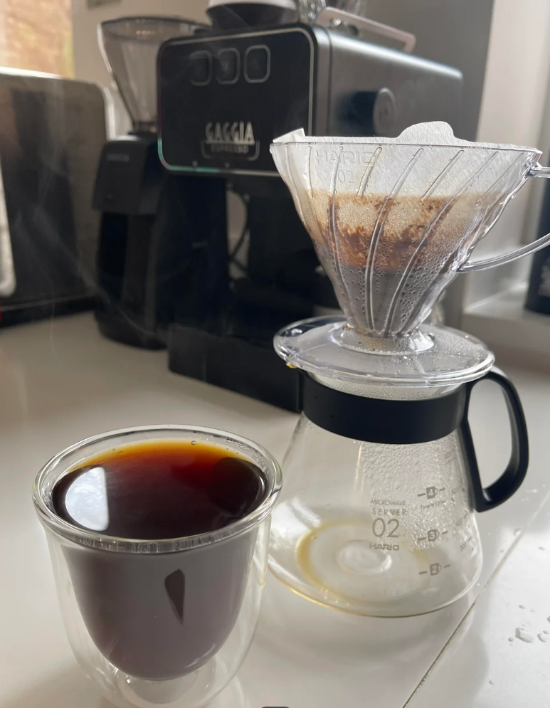 Computer screen showing an online post about using a coffee grinder for better espresso extraction
