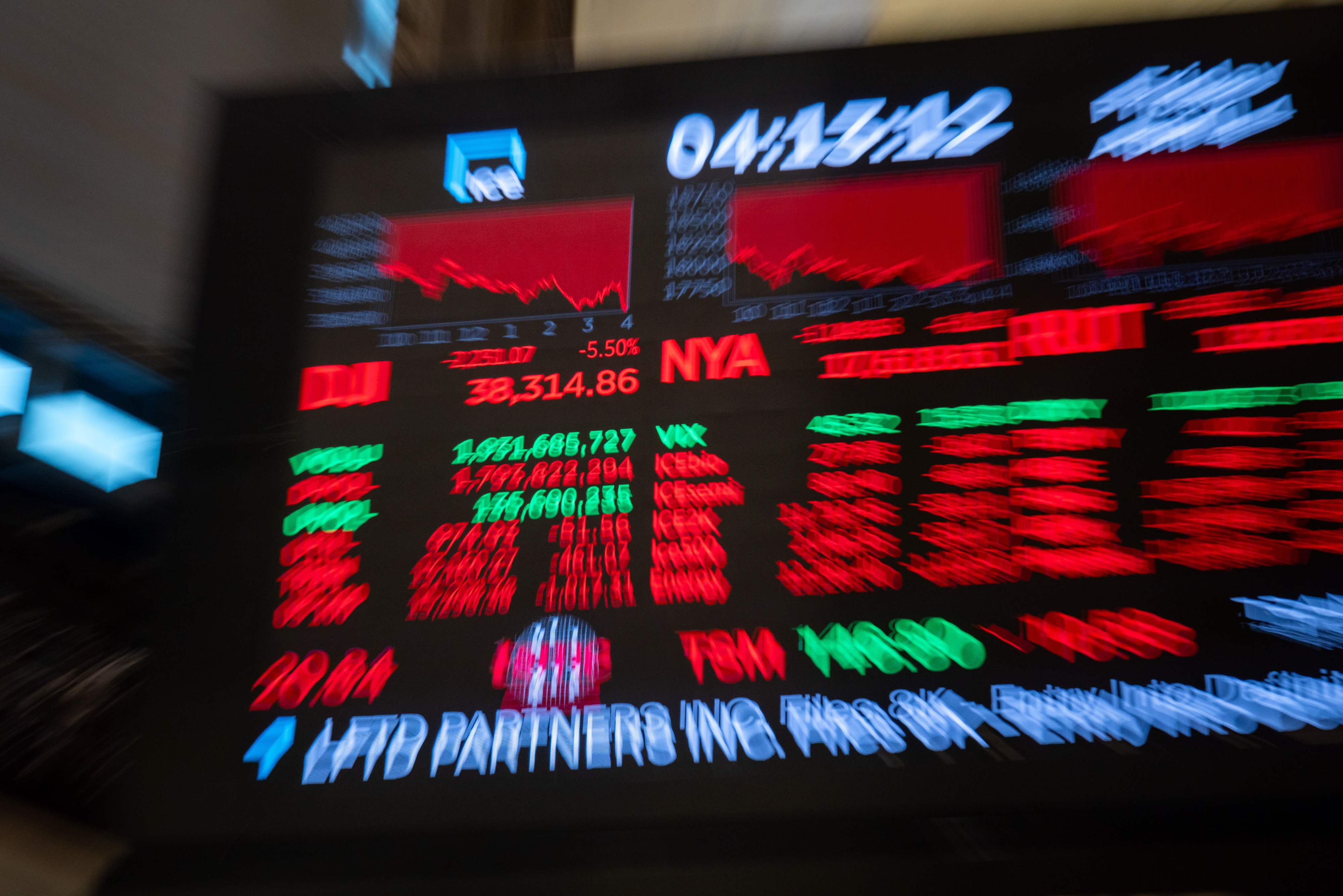 Stock market display showing a sharp drop in numbers, indicating a significant economic downturn or market reaction