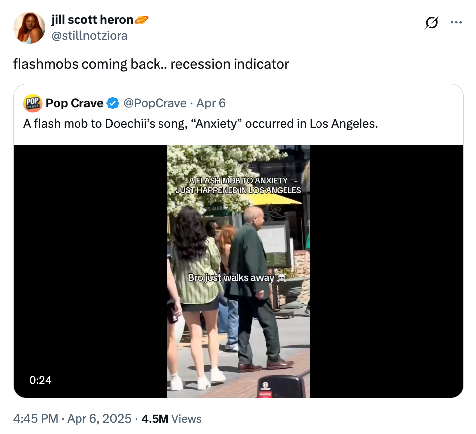 Tweet showing a flash mob in Los Angeles set to Doechii's song "Anxiety," with a passerby walking away