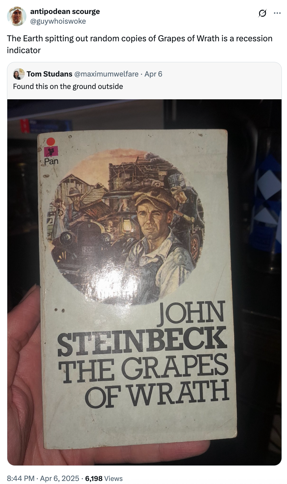 Person holding a vintage copy of "The Grapes of Wrath" by John Steinbeck, with a tweet suggesting it's a recession indicator
