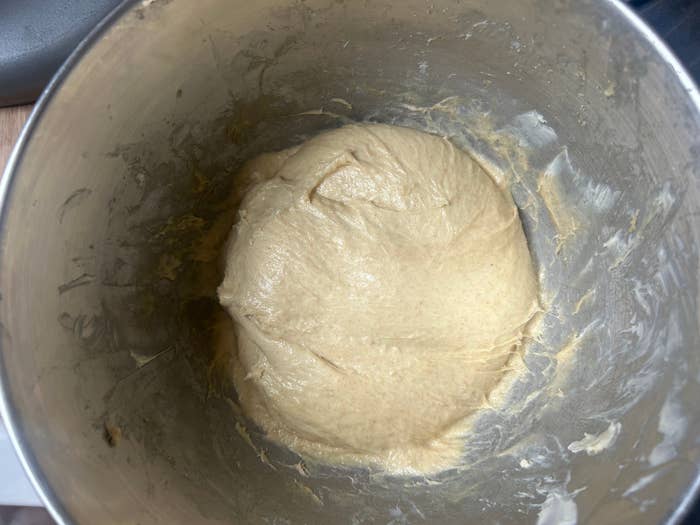 Pizza dough in a mixing bowl