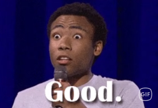 Person holding a microphone, looking surprised with open eyes and mouth, above the caption "Good."