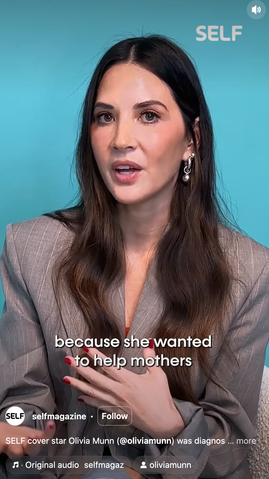 Person in a blazer speaking during an interview against a plain background, text onscreen mentions helping mothers