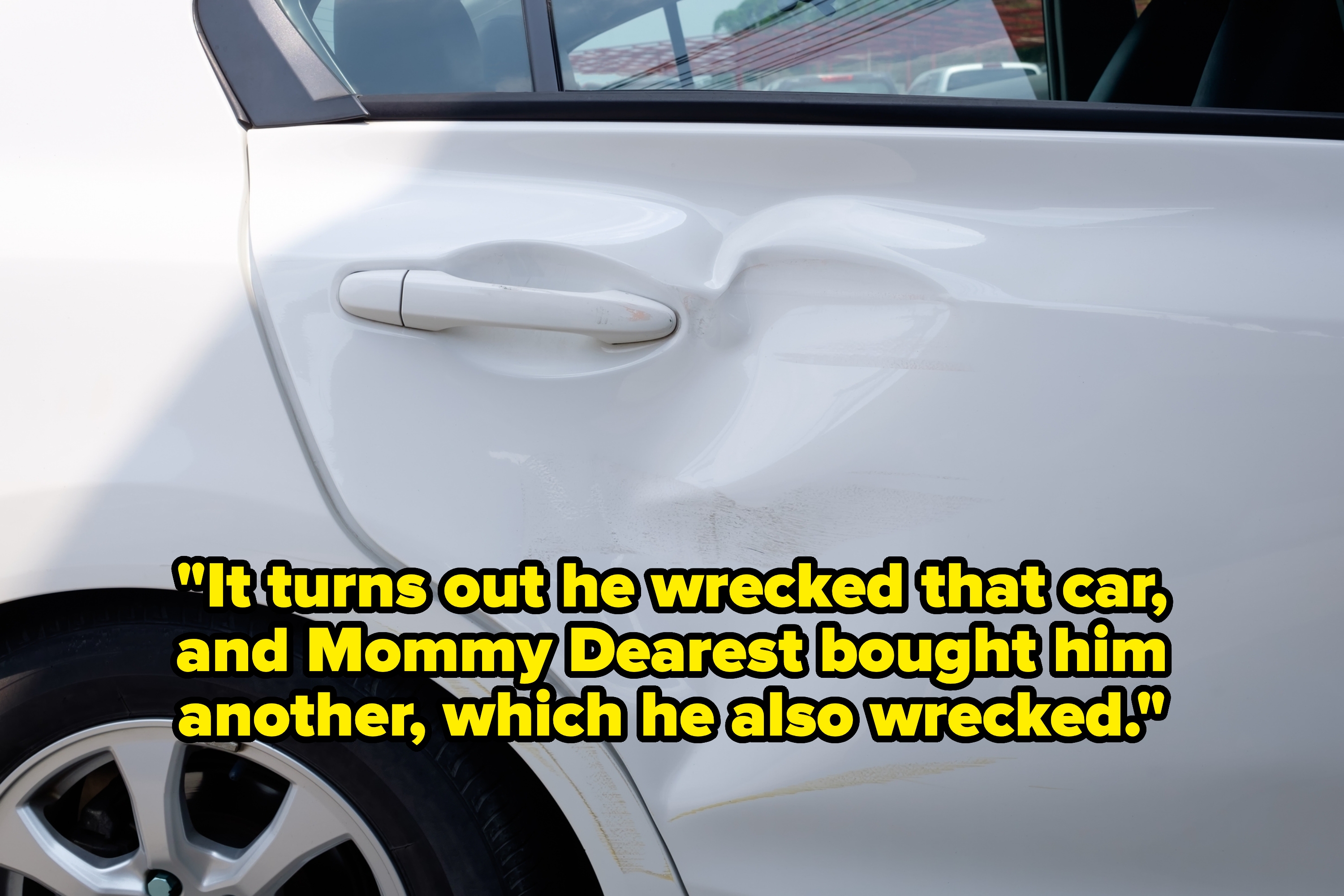 Dented car door with visible damage, suggesting an impact or accident