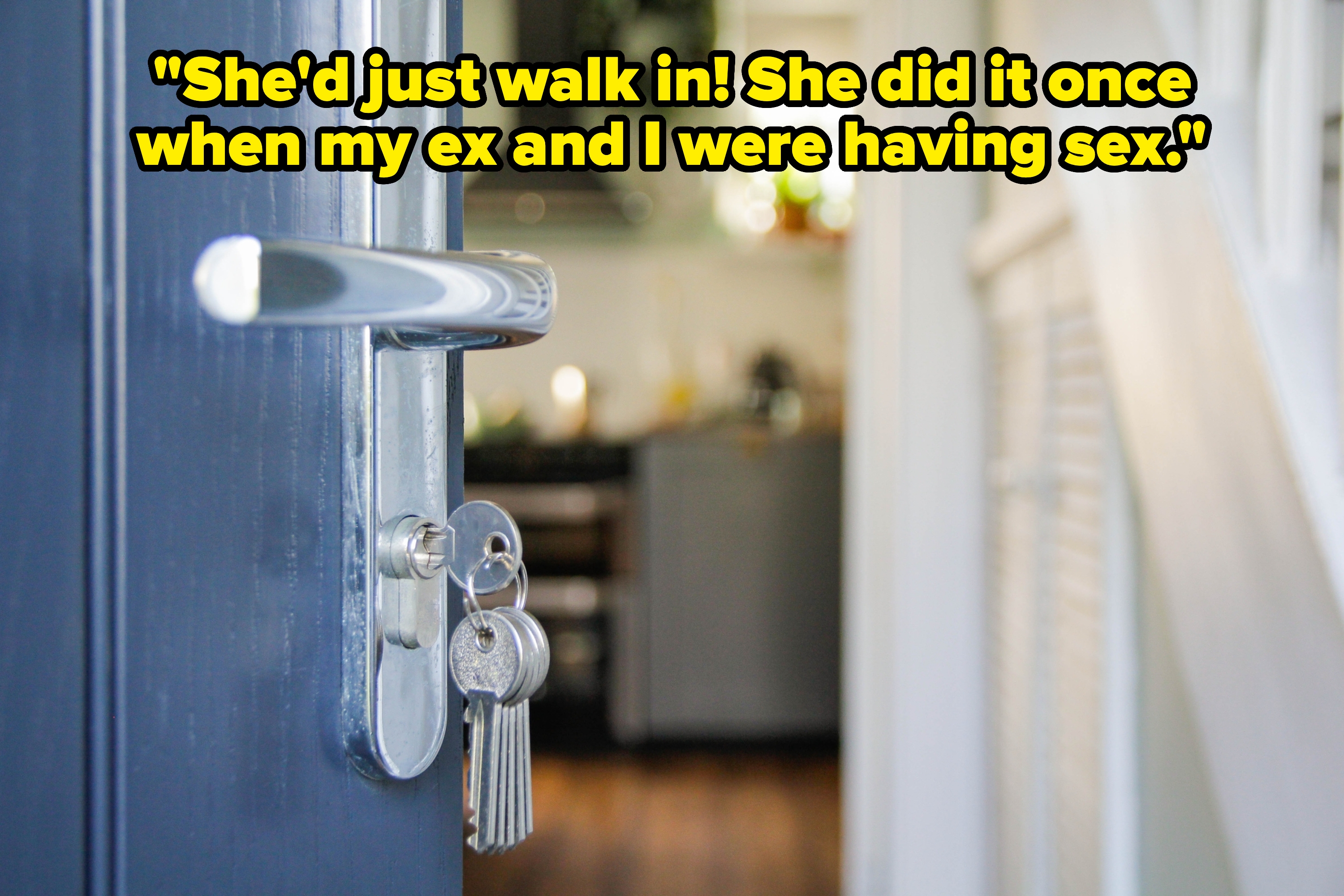 A door slightly ajar with a keychain in the lock