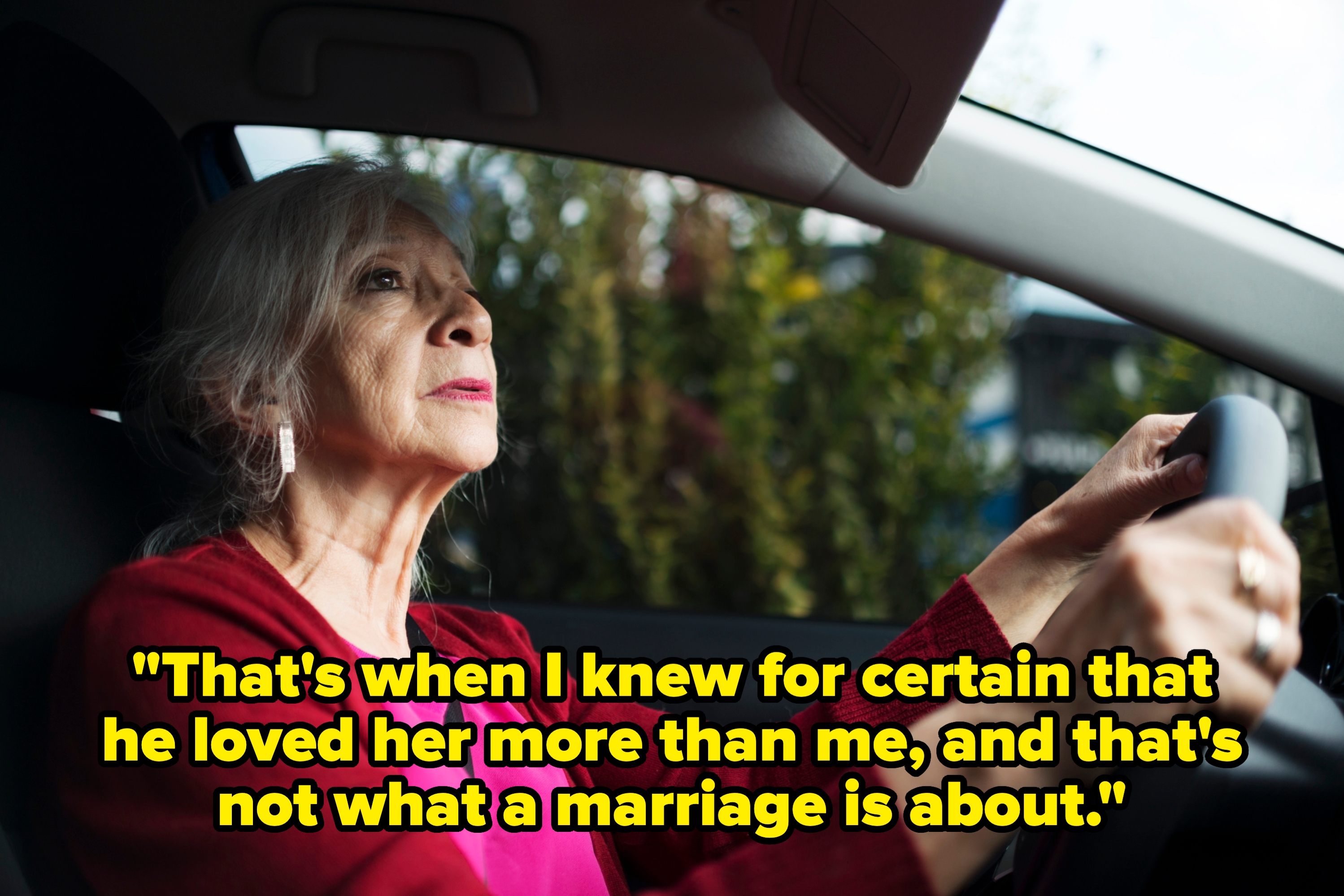 Older adult with earrings driving, focused and thoughtful