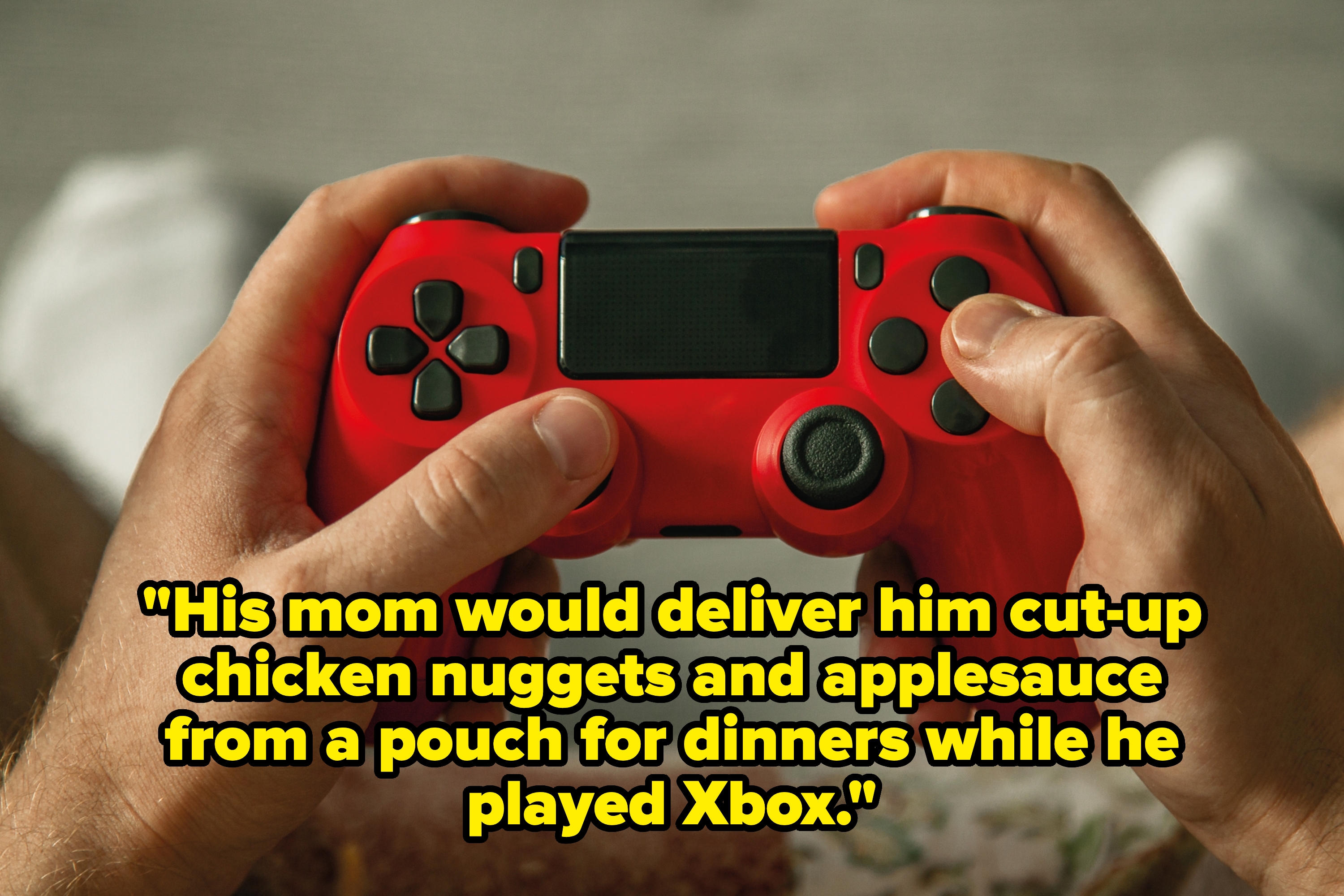 Person holding a video game controller, possibly playing a game