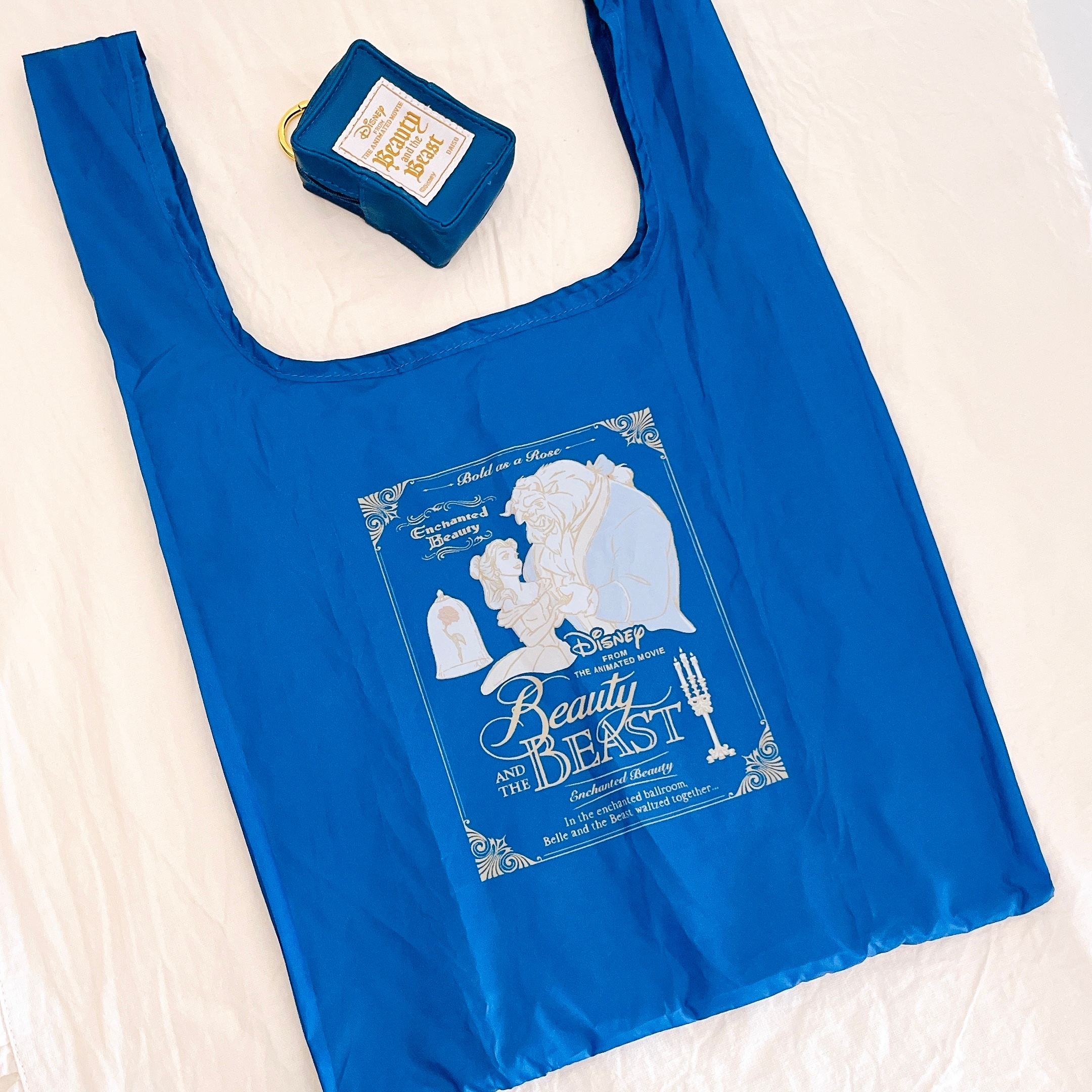 THREEPPY(スリーピー)の「チャーム付エコバッグ、NV(美女と野獣)」