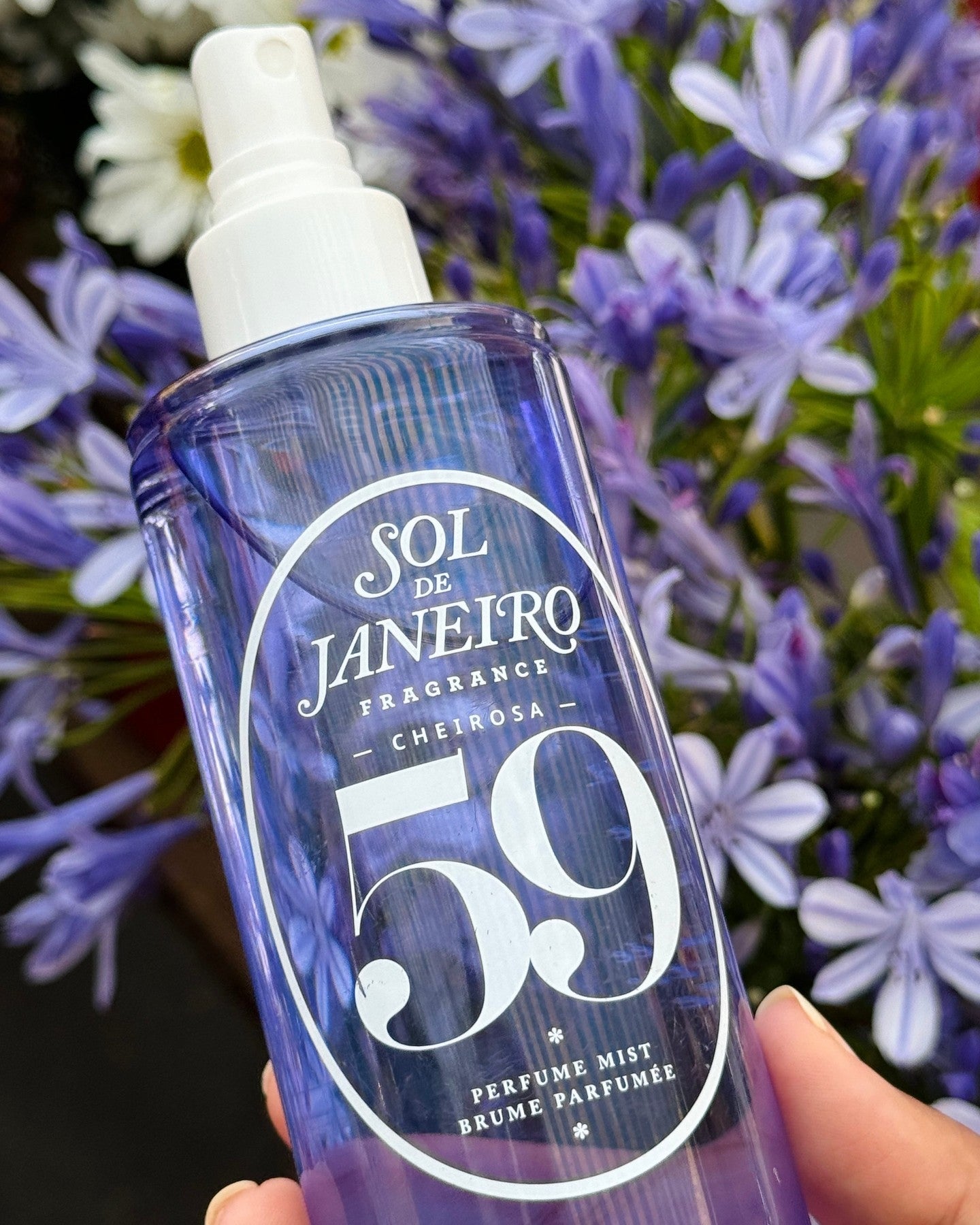 Botol kabut parfum berlabel 