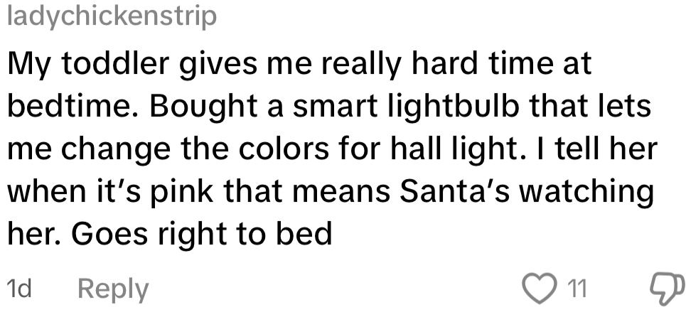 Parent uses smart lightbulb to signal "Santa's watching" by changing hall light to pink, helping toddler go to bed easily