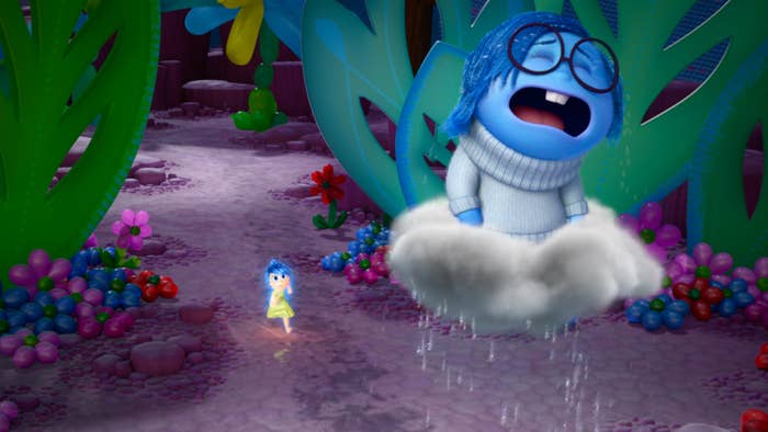 Joy running after Sadness on a cloud in "Inside Out."