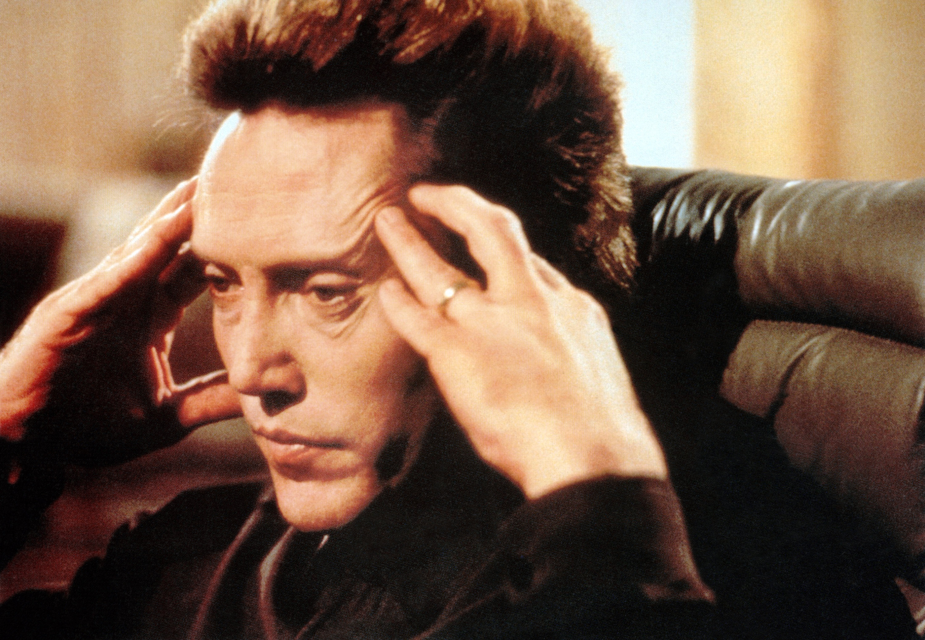 Christopher Walken rubbing his temples in "Communion."